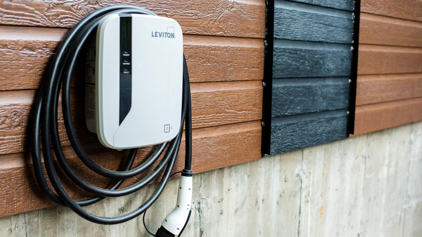 A wall charger attached to the side of a building